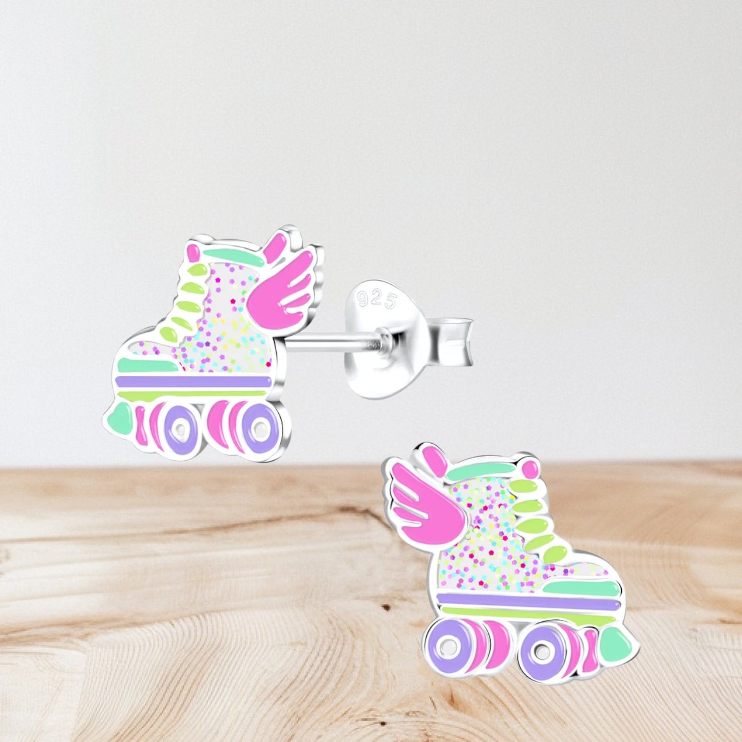 Sterling silver roller skate stud earrings