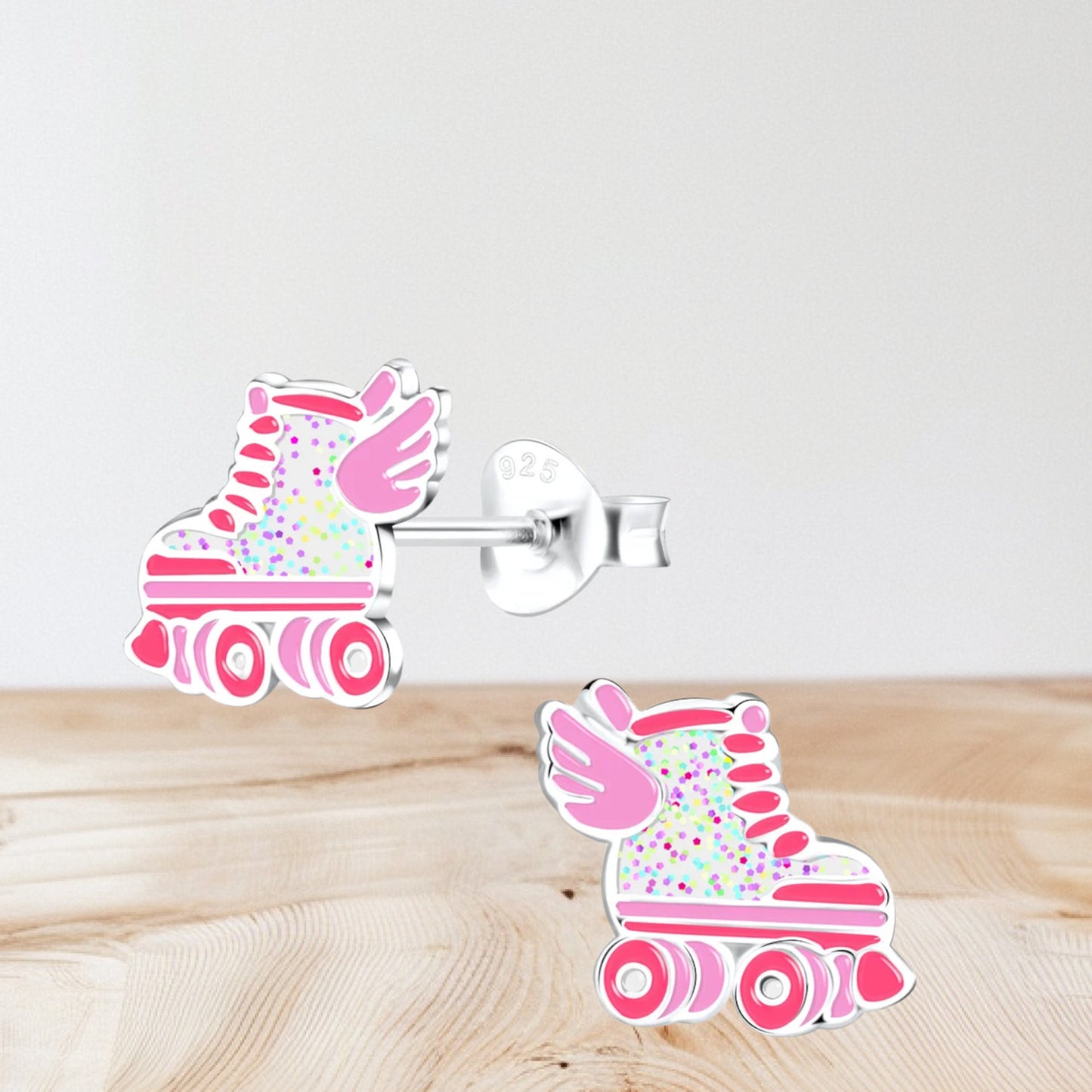 Sterling silver roller skate stud earrings